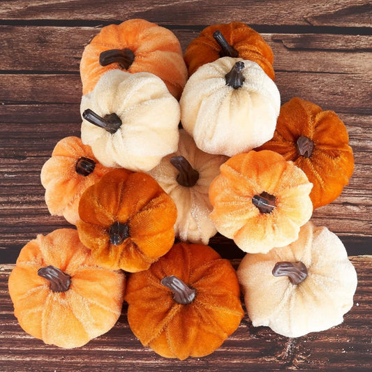 Set of 12 velvet pumpkins in orange, brown, and champagne